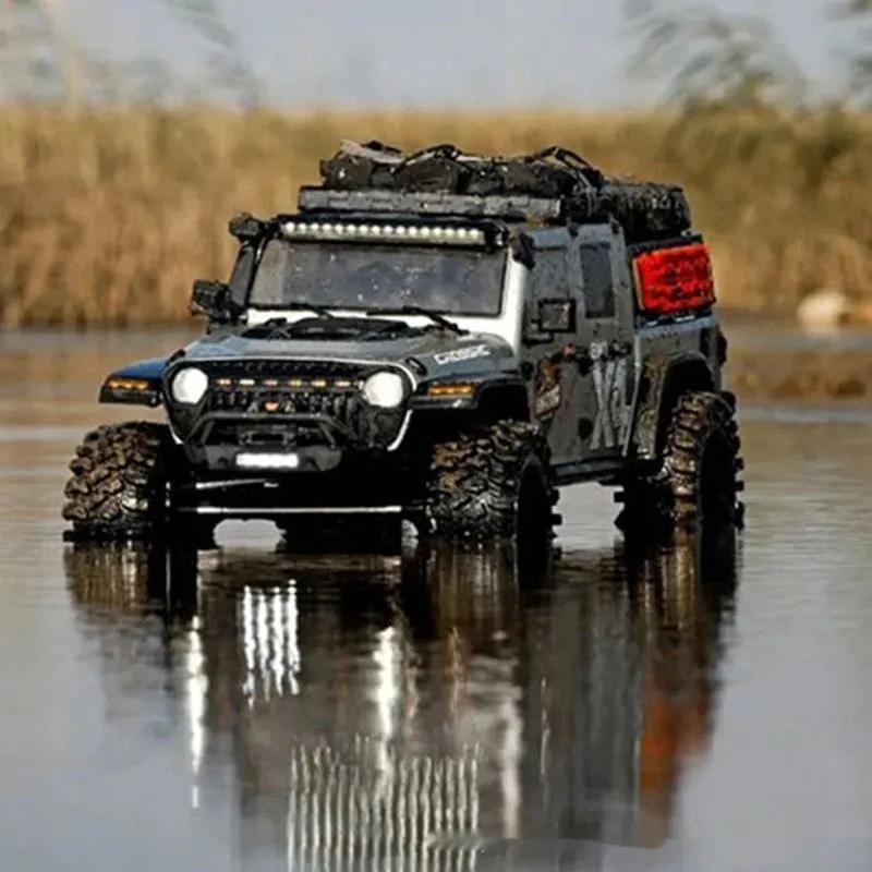 Plastic Big Leopard remote control electric rock crawler with four-wheel drive in Gun Gray colour on dirt surface