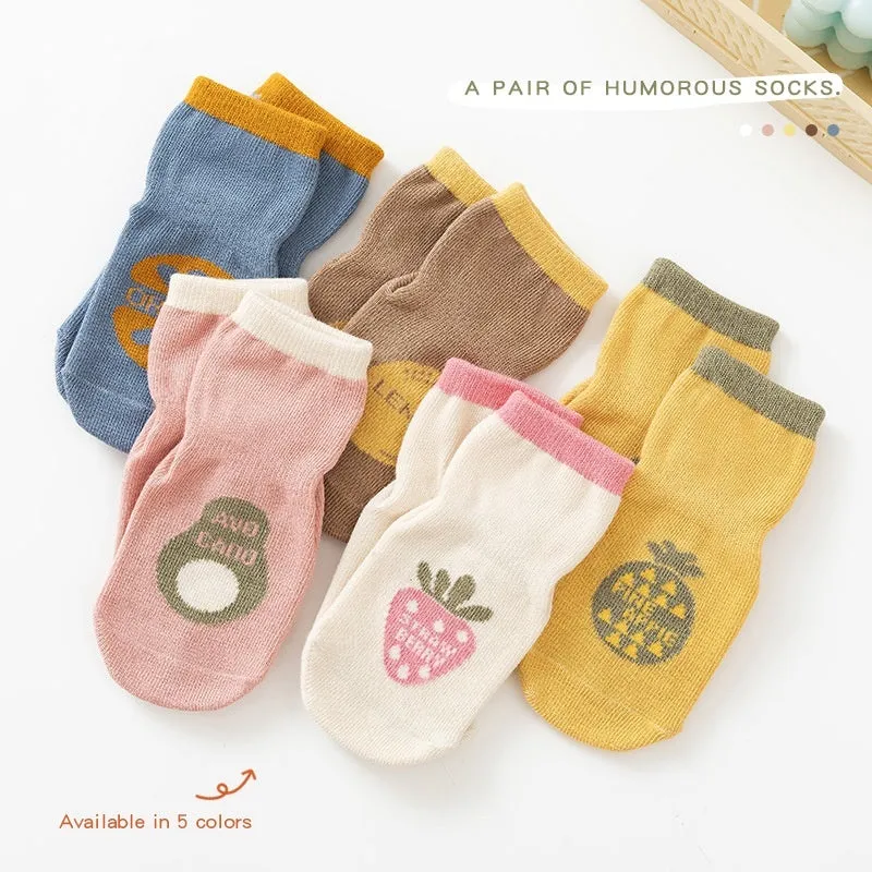 Combed cotton cartoon fruit print mid-calf socks in pink avocado colour on neutral background