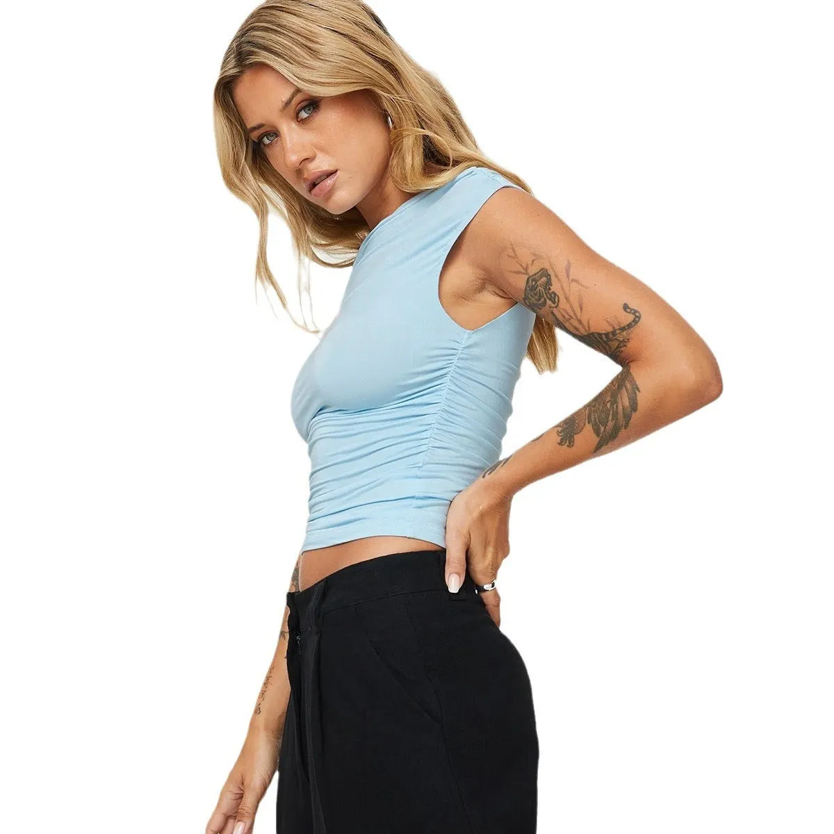 Women's light blue sleeveless oblique collar pleated slim-fit top on model