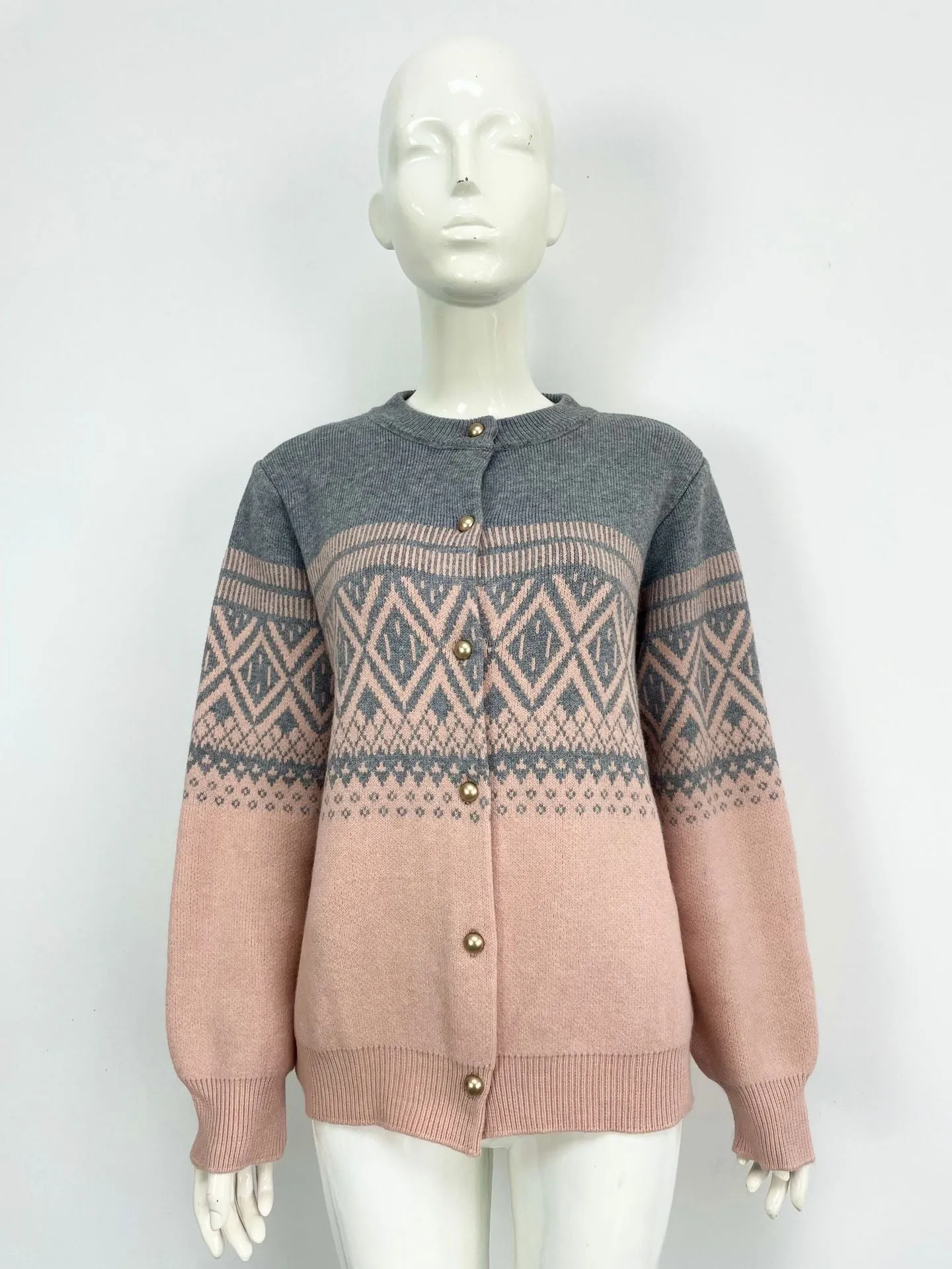 Grey women's alpaca wool cardigan with diamond knit pattern and contrast colour long sleeves.