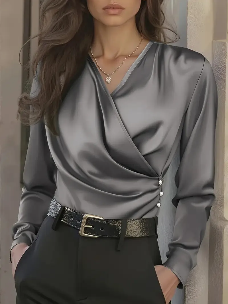 Women's v-neck slim fit polyester shirt in white with patchwork detail, long sleeves, and pullover style