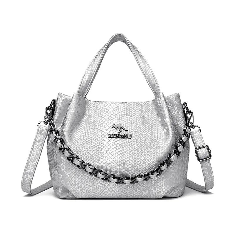 Genuine leather horizontal square shoulder bag with chain detail and snakeskin texture, multiple zippered compartments, available in various colours