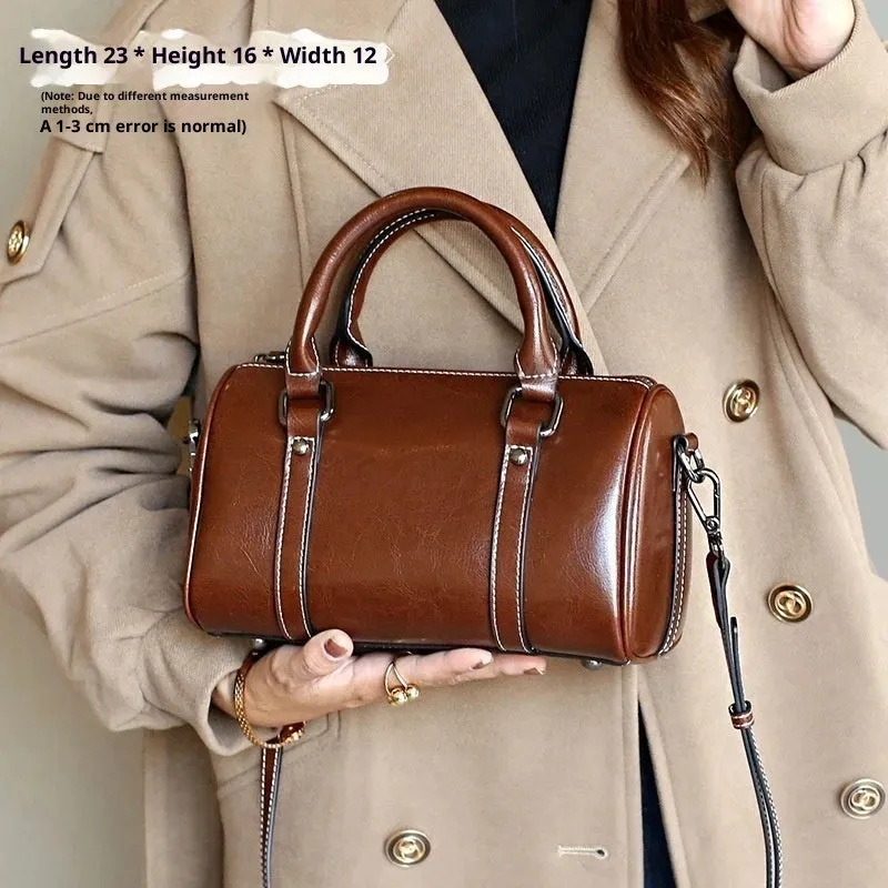 Cortex Lady casual zip crossbody bag in top grain leather, cylindrical shape, patchwork, available in caramel colour