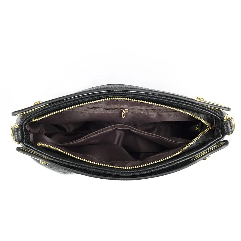 Genuine leather crossbody bag with pleated shoulder strap and wrinkled composite leather finish in horizontal square shape