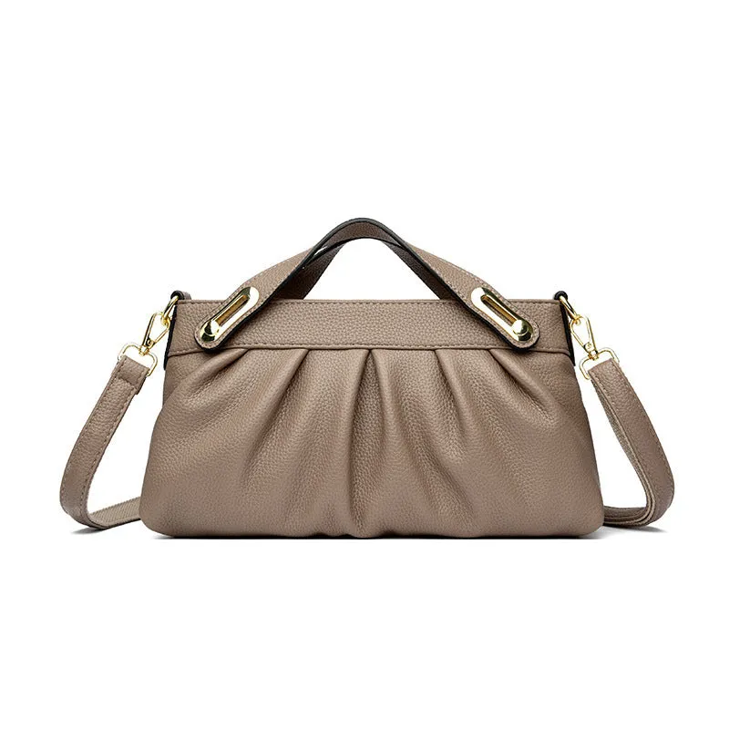 Genuine leather crossbody bag with pleated shoulder strap and wrinkled composite leather finish in horizontal square shape