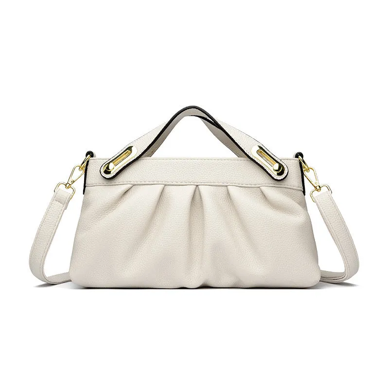 Genuine leather crossbody bag with pleated shoulder strap and wrinkled composite leather finish in horizontal square shape