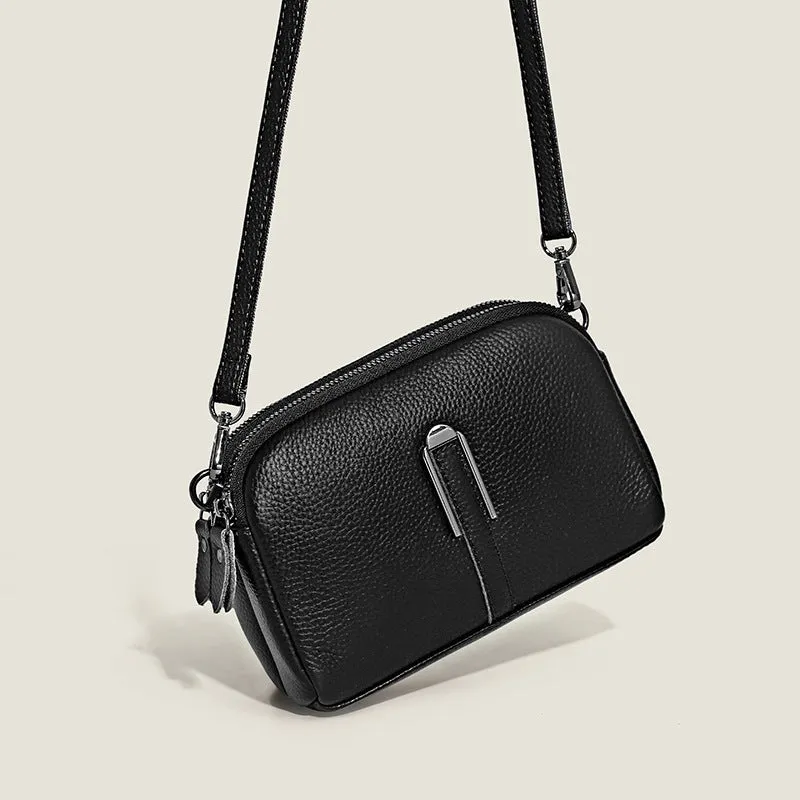 Minimalist crossbody bag in top-grain leather with spliced design, horizontal square shape, inner zippered pocket