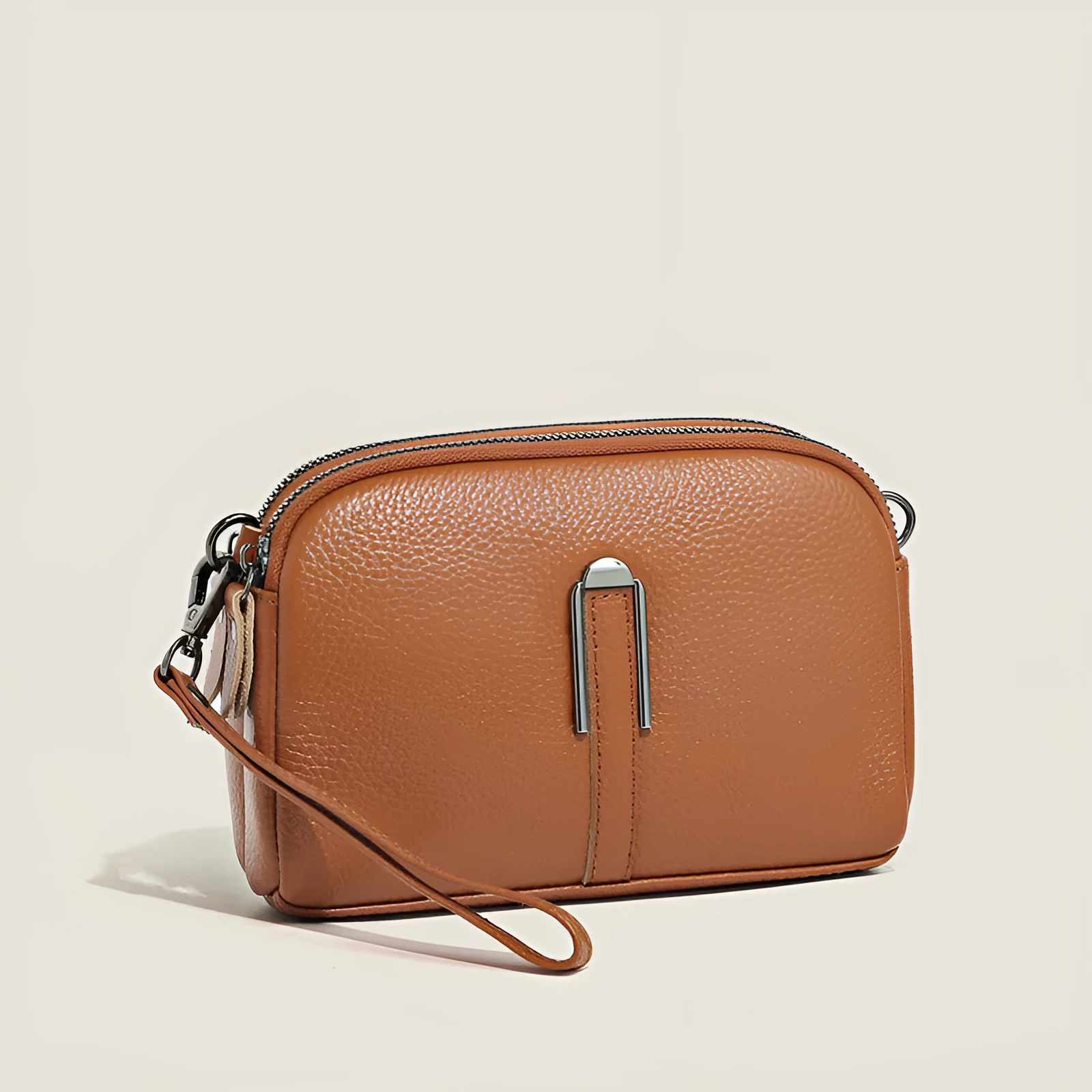 Minimalist crossbody bag in top-grain leather with spliced design, horizontal square shape, inner zippered pocket