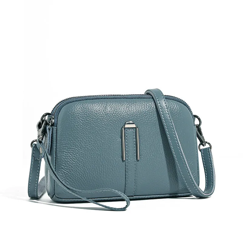 Minimalist crossbody bag in top-grain leather with spliced design, horizontal square shape, inner zippered pocket