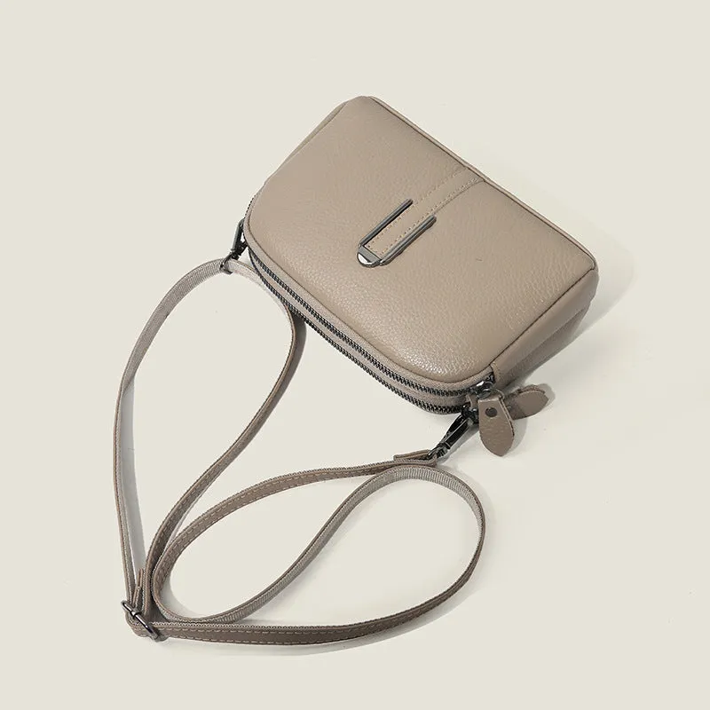 Minimalist crossbody bag in top-grain leather with spliced design, horizontal square shape, inner zippered pocket