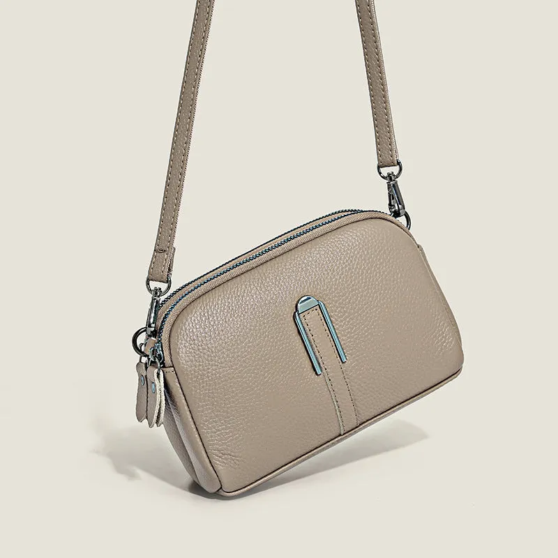 Minimalist crossbody bag in top-grain leather with spliced design, horizontal square shape, inner zippered pocket