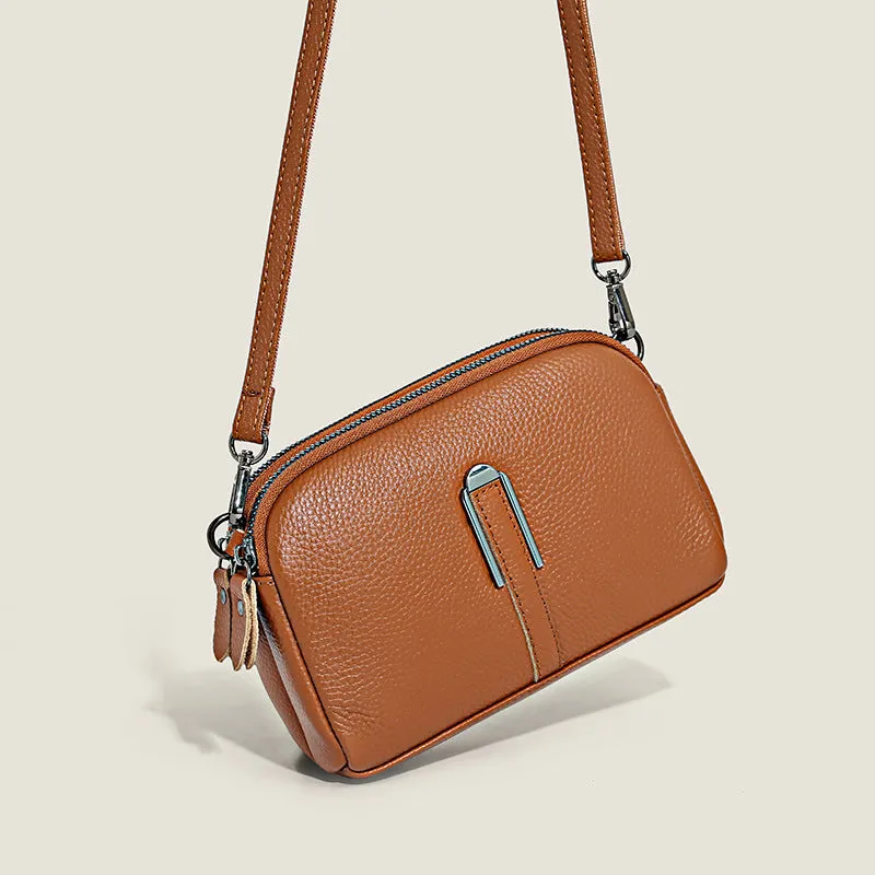 Minimalist crossbody bag in top-grain leather with spliced design, horizontal square shape, inner zippered pocket