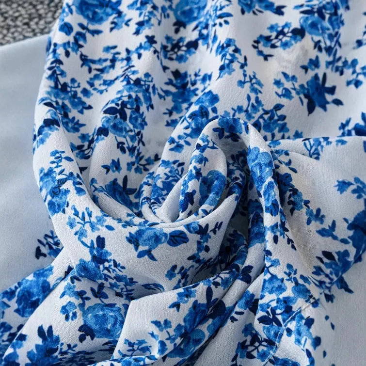 Short-sleeved V-neck A-line flared floral dress with bow at high waist, mid-length polyester dress