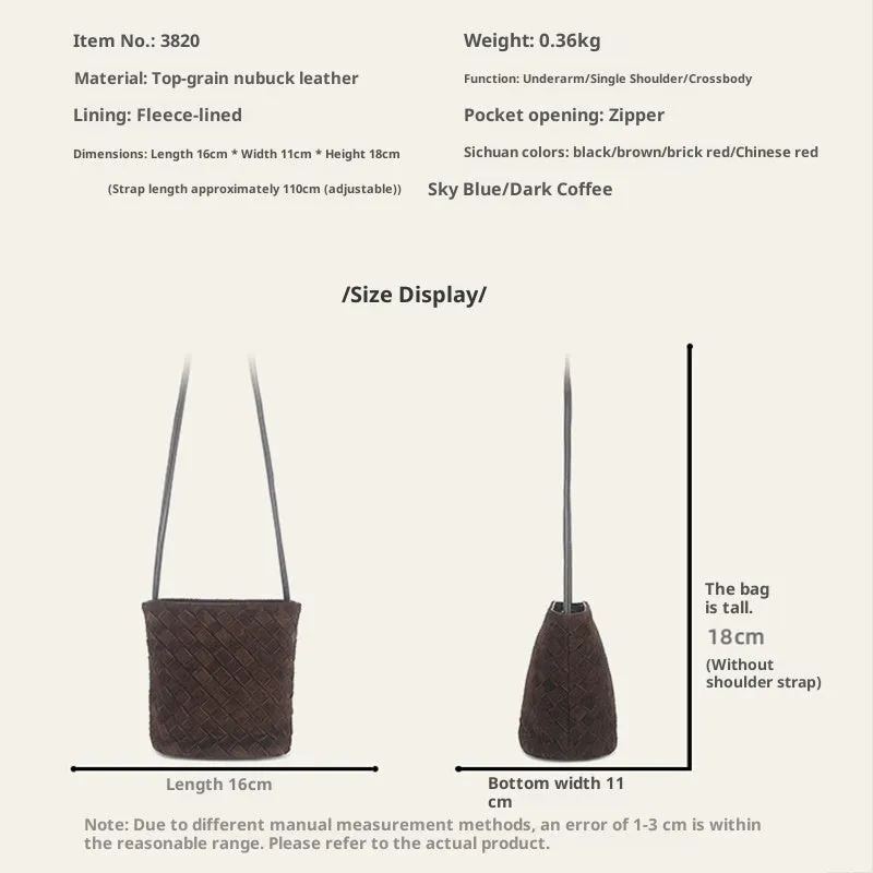 Cowhide leather barrel-shaped zip crossbody bag in black with weaving detail and crossbody strap