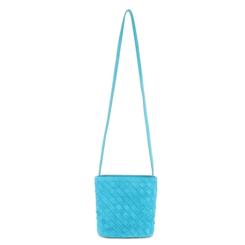 Cowhide leather barrel-shaped zip crossbody bag in black with weaving detail and crossbody strap