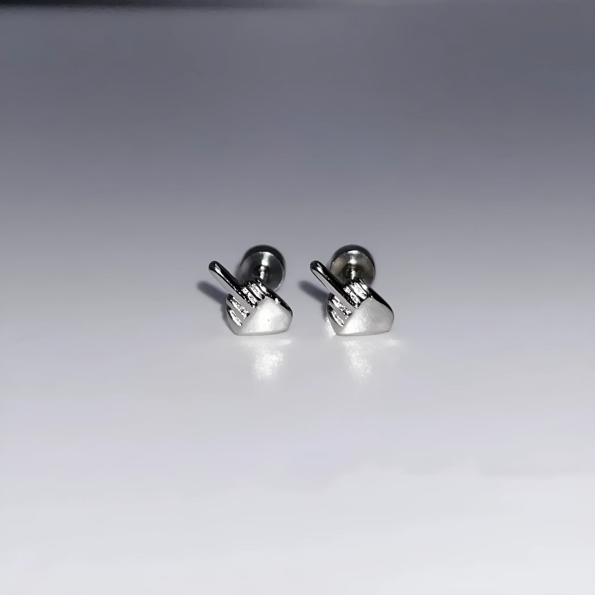 Niche quirky middle finger alloy screw clasp ear cartilage earring for women, vertical motif, bow shape, one pair