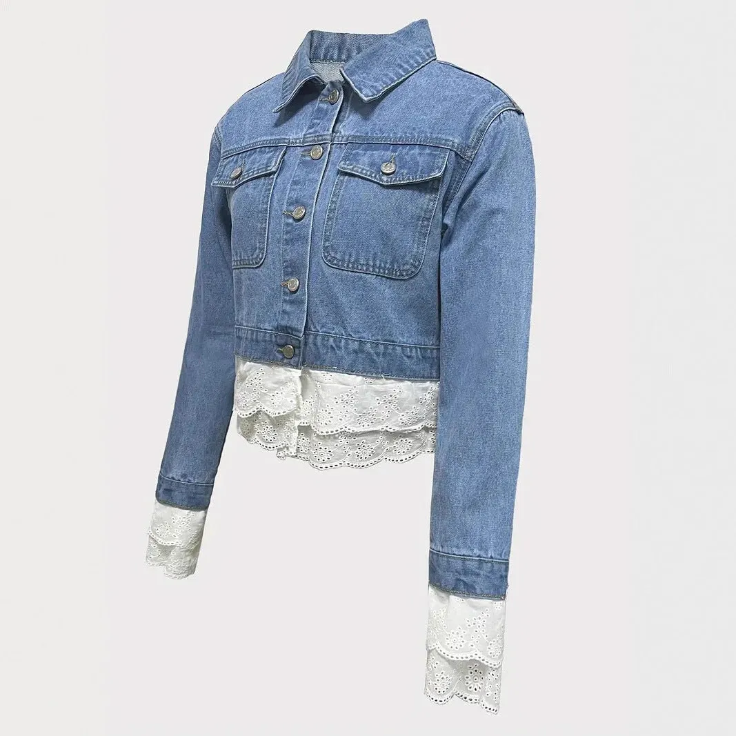 Blue women's denim jacket with lace stitching detail on the front, showing long sleeves.