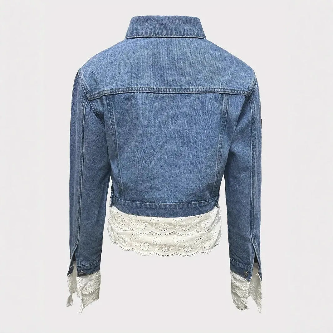Blue women's denim jacket with lace stitching detail on the front, showing long sleeves.