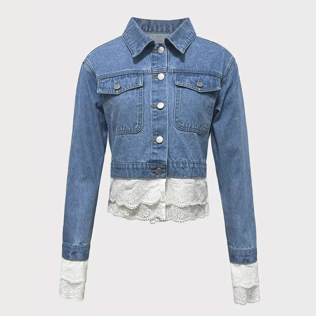 Blue women's denim jacket with lace stitching detail on the front, showing long sleeves.
