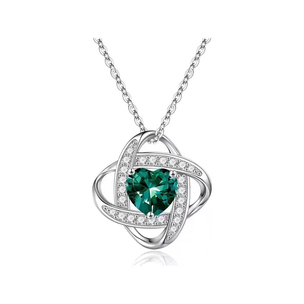 Close-up of a ladies' copper heart-shaped necklace with an electroplated finish in a platinum colour variant.