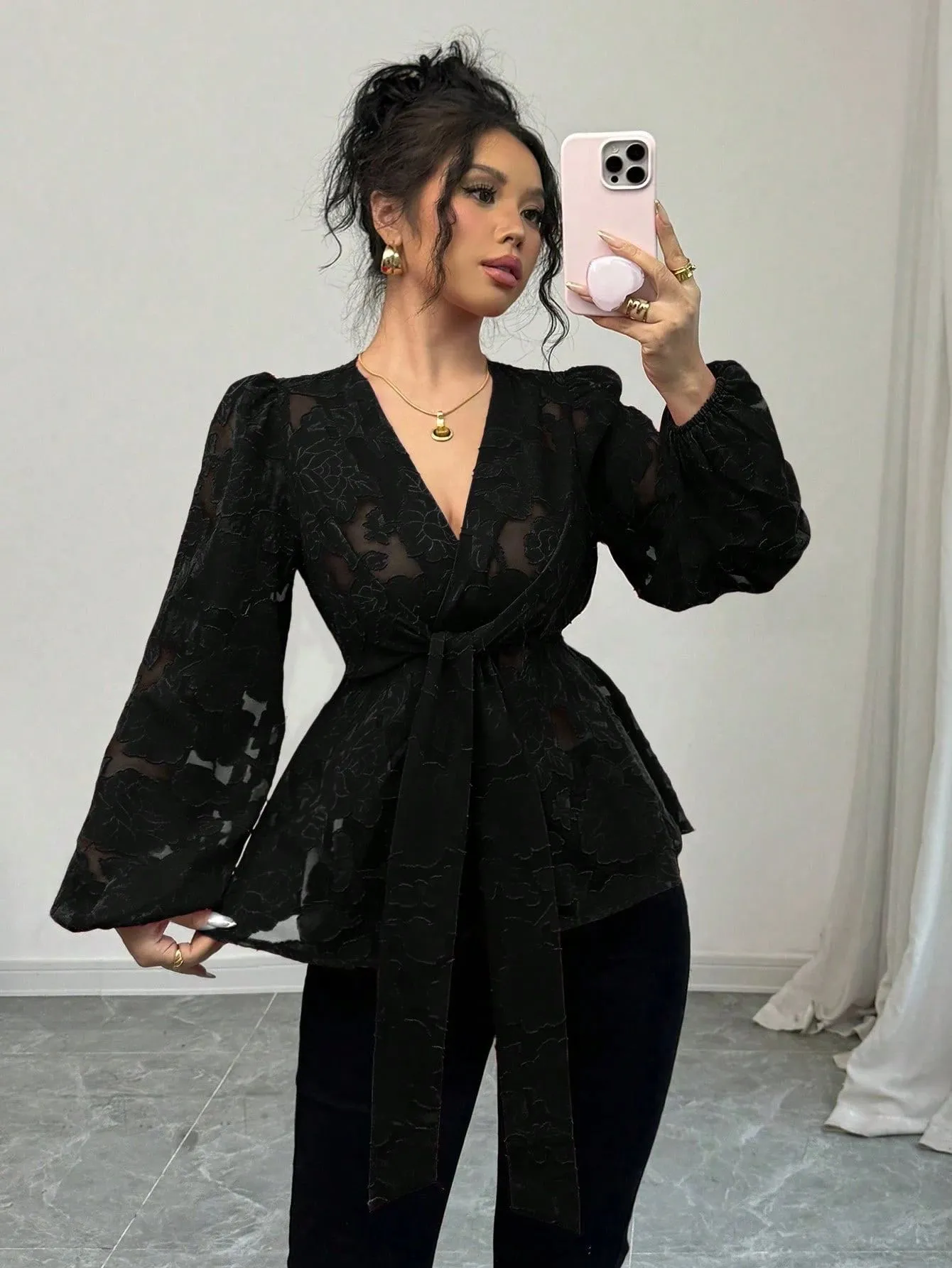 Women's black hollow out embroidery polyester shirt with V-neck and long sleeves, front view