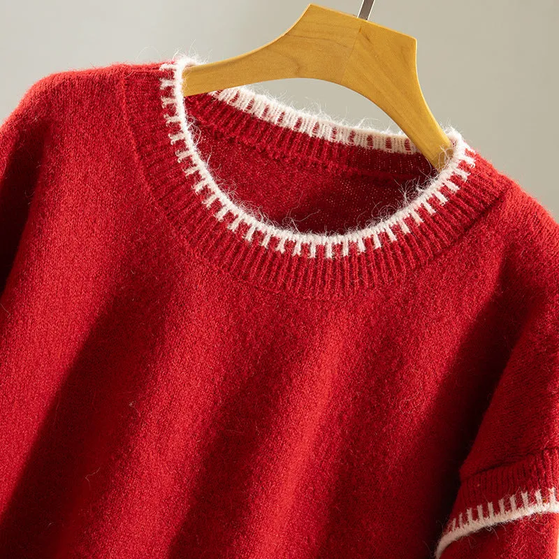 Women's acrylic pullover sweater in thick knit with long ruffle sleeves and patchwork design, available in apricot and red