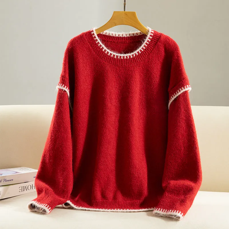 Women's acrylic pullover sweater in thick knit with long ruffle sleeves and patchwork design, available in apricot and red