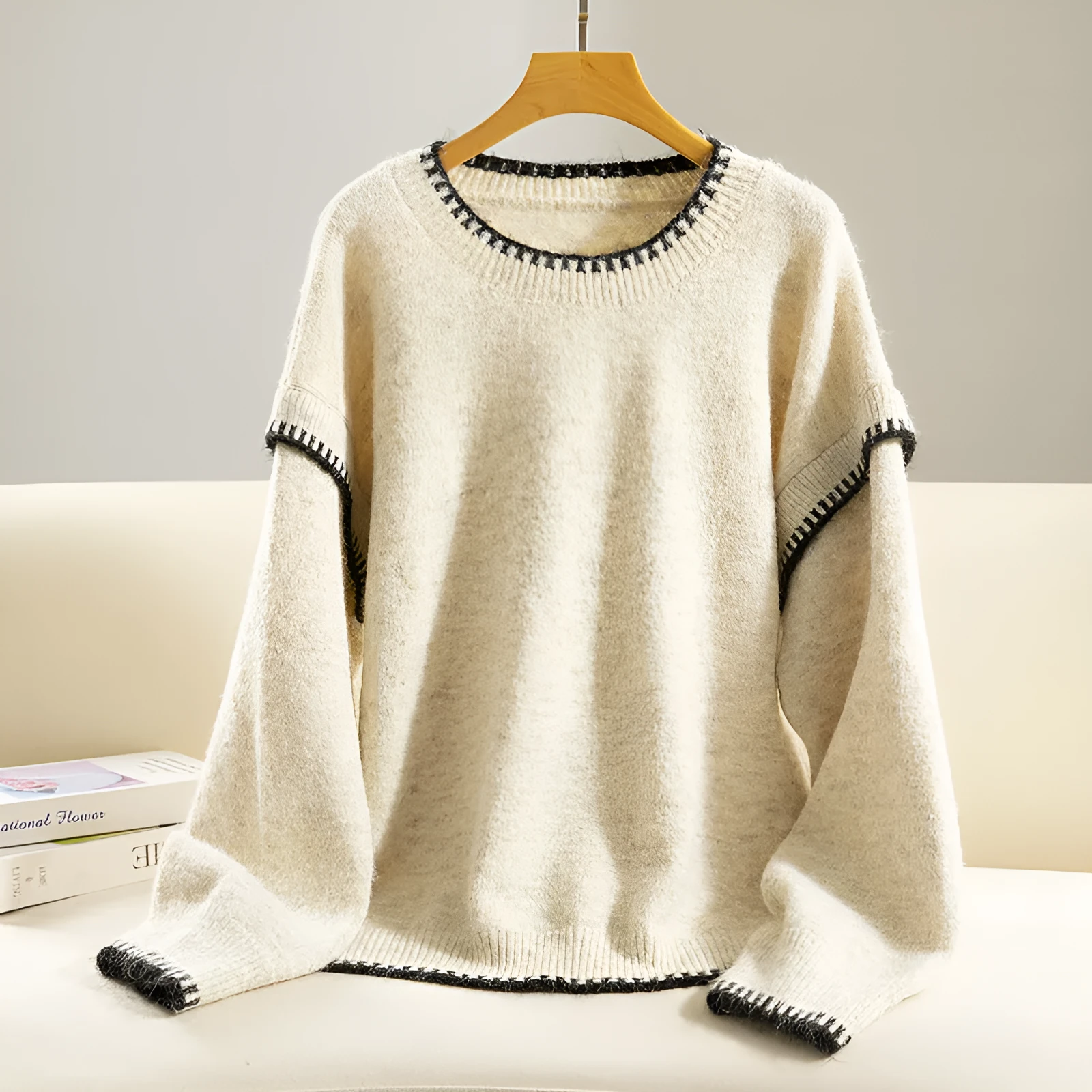 Women's acrylic pullover sweater in thick knit with long ruffle sleeves and patchwork design, available in apricot and red