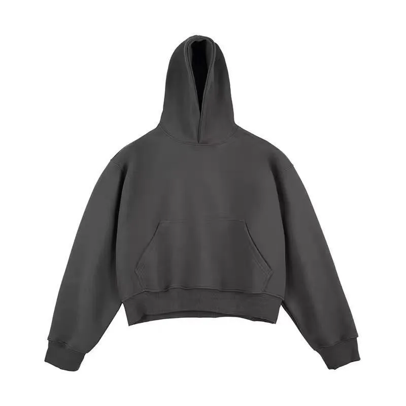 Man wearing a dark grey Chinese cotton composite hooded sweater with a removable hood and long sleeves.