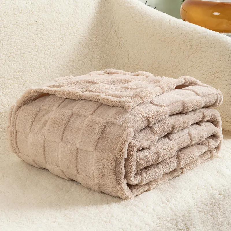 Geometric pattern polyester blanket in cream colour showing textured design and thickened construction
