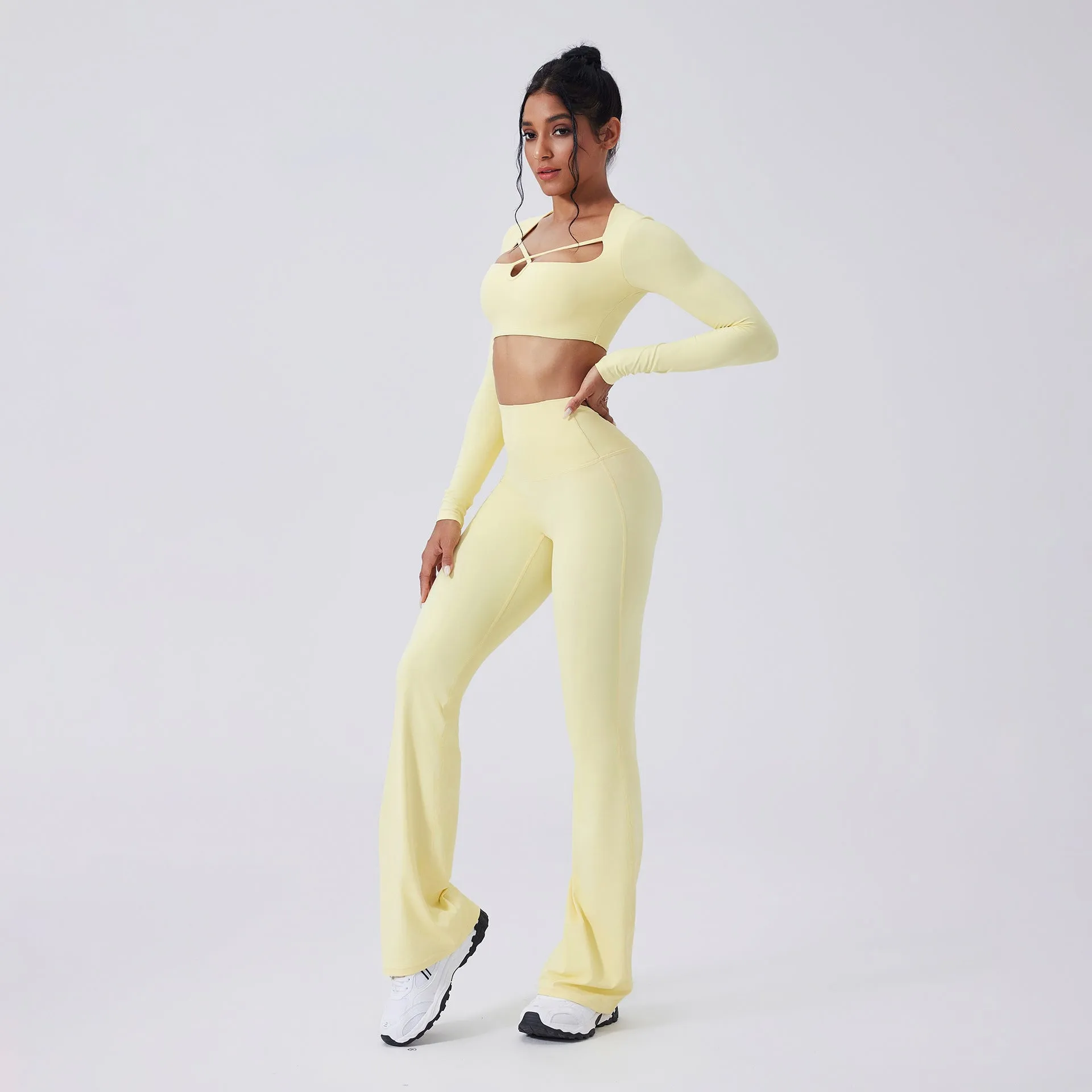 Color-blocking yoga set with hollow-out top and high-waist flared pants in Egret White, black, light banana, espresso, navy peony