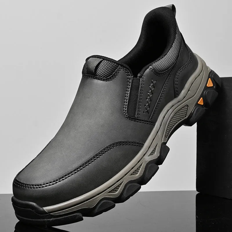 Men's dark brown casual leather shoes with round toe and flat rubber sole.