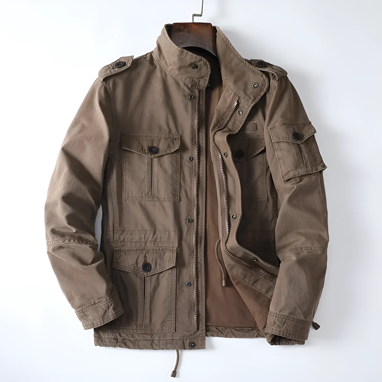 Men's loose-fit casual cotton jacket in light brown with zip front, shown on a model.