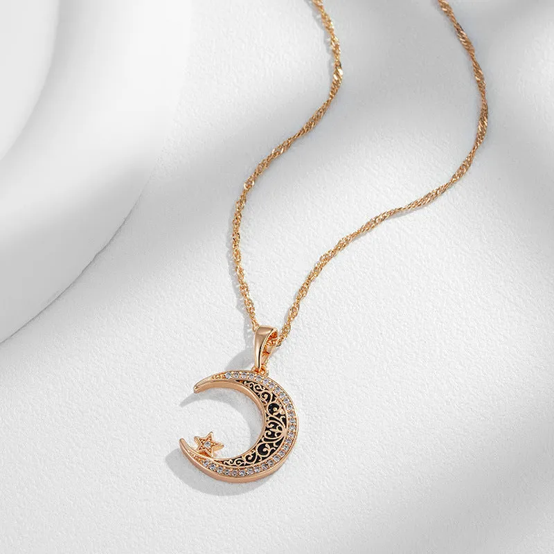 Rose gold coloured necklace with star and moon pendant on water wave chain