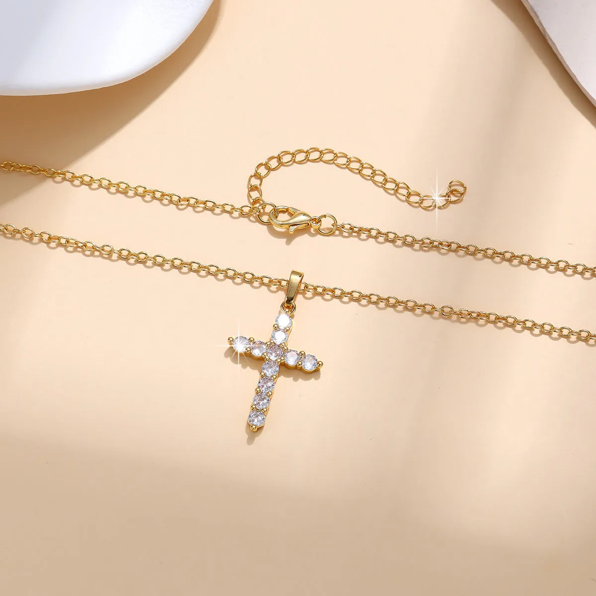 Gold plated cross necklace for women with cubic zirconia stones on a 45 cm chain, shiny finish