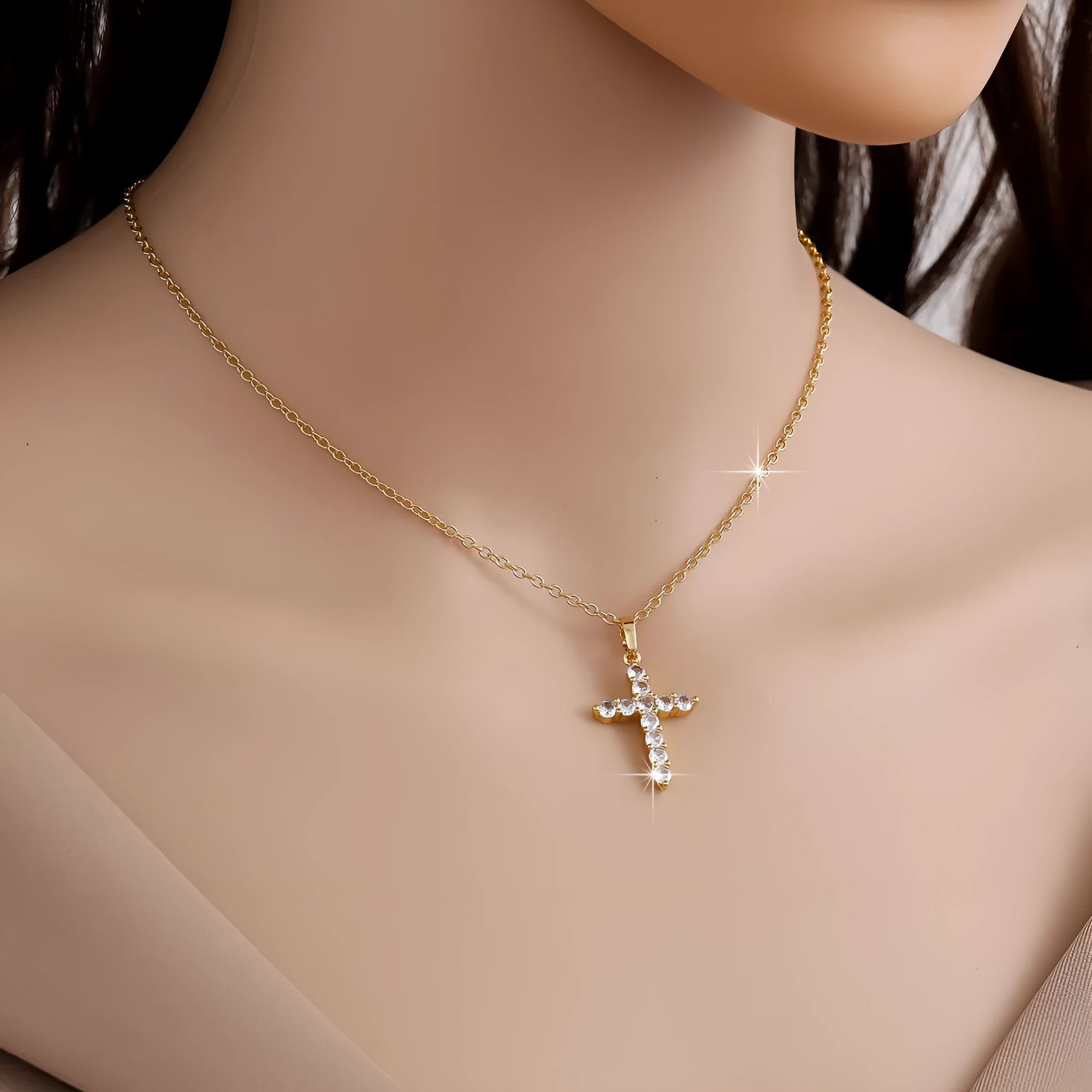 Gold plated cross necklace for women with cubic zirconia stones on a 45 cm chain, shiny finish