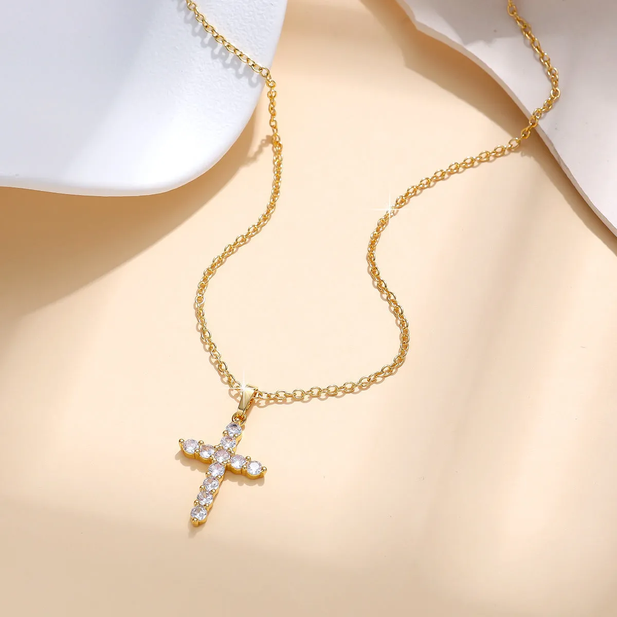 Gold plated cross necklace for women with cubic zirconia stones on a 45 cm chain, shiny finish