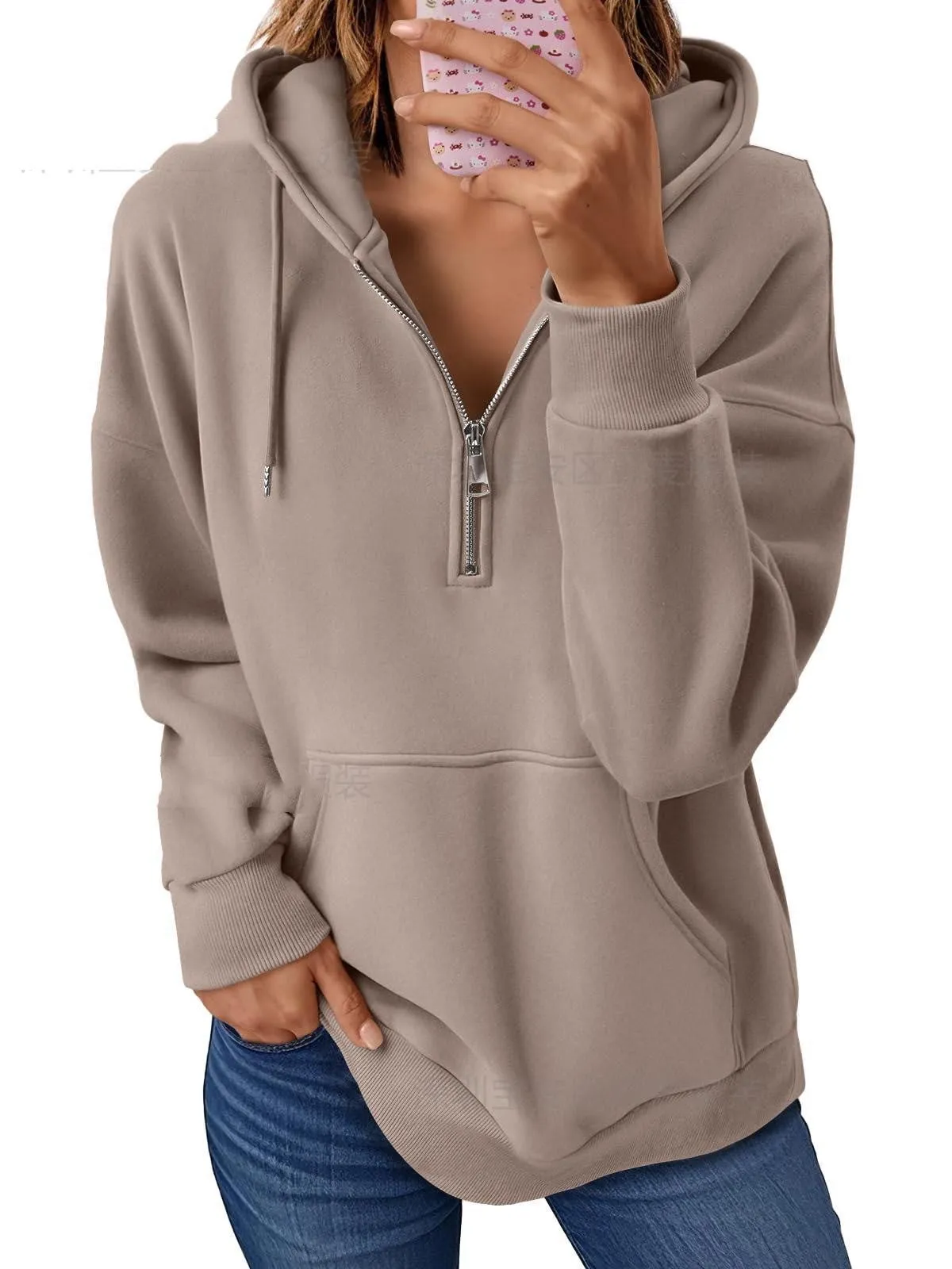 Polyester pullover hooded sweatshirt in peacock green with zip pocket on front. Long sleeve, solid colour, casual style.