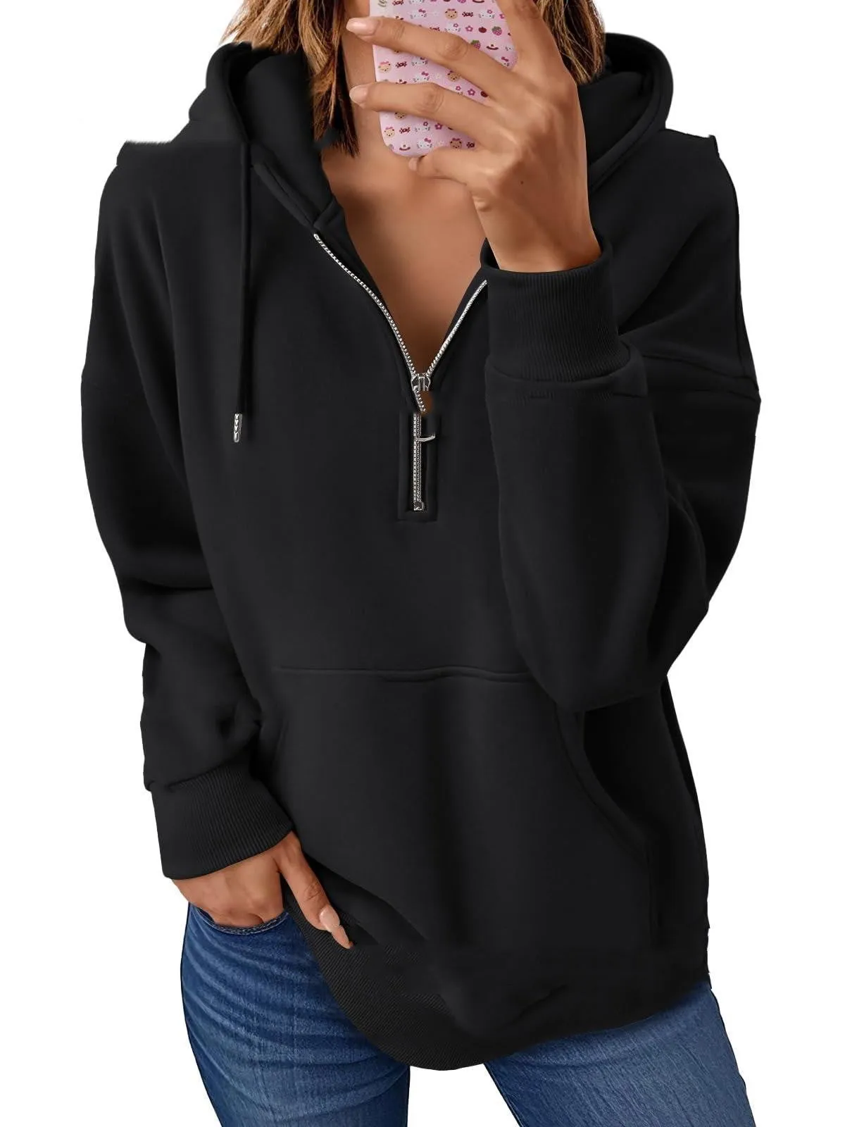 Polyester pullover hooded sweatshirt in peacock green with zip pocket on front. Long sleeve, solid colour, casual style.