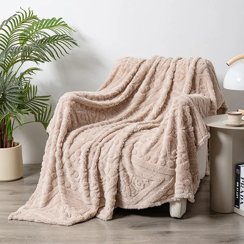 Cotton velvet jacquard sofa blanket showing plant flower pattern on solid colour background