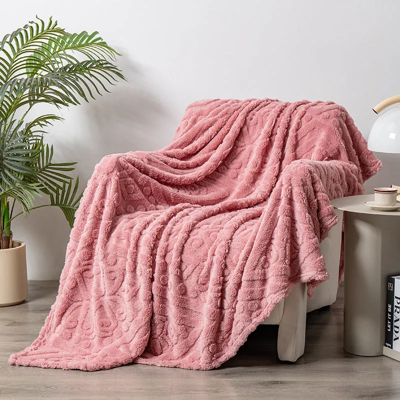 Cotton velvet jacquard sofa blanket showing plant flower pattern on solid colour background
