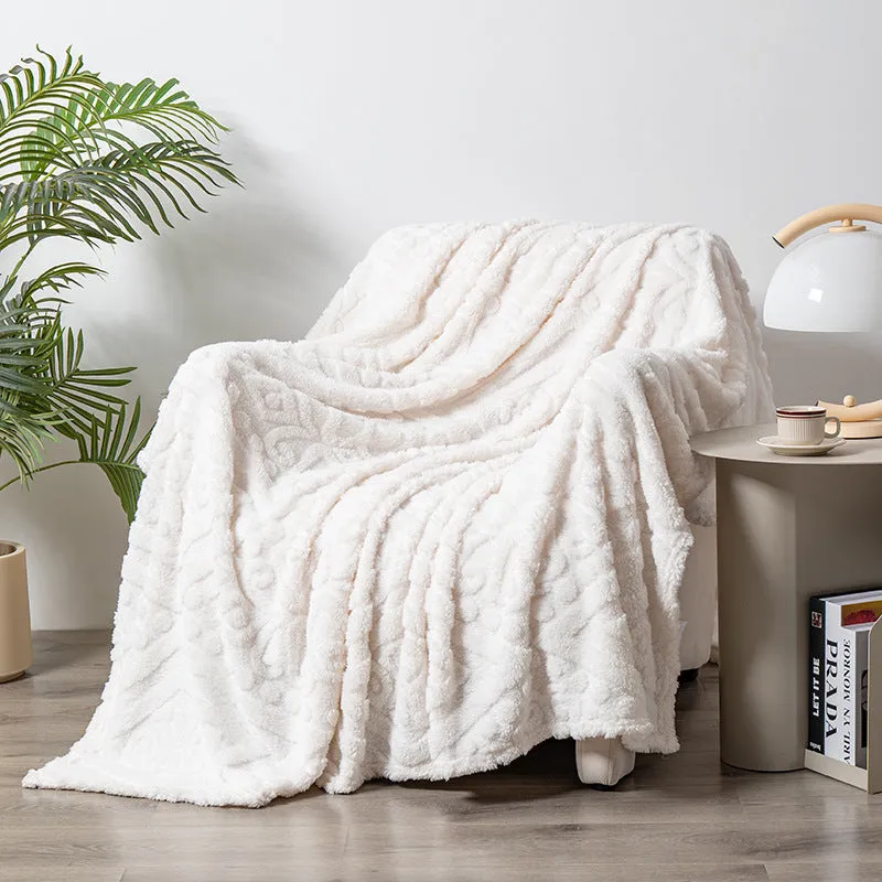 Cotton velvet jacquard sofa blanket showing plant flower pattern on solid colour background