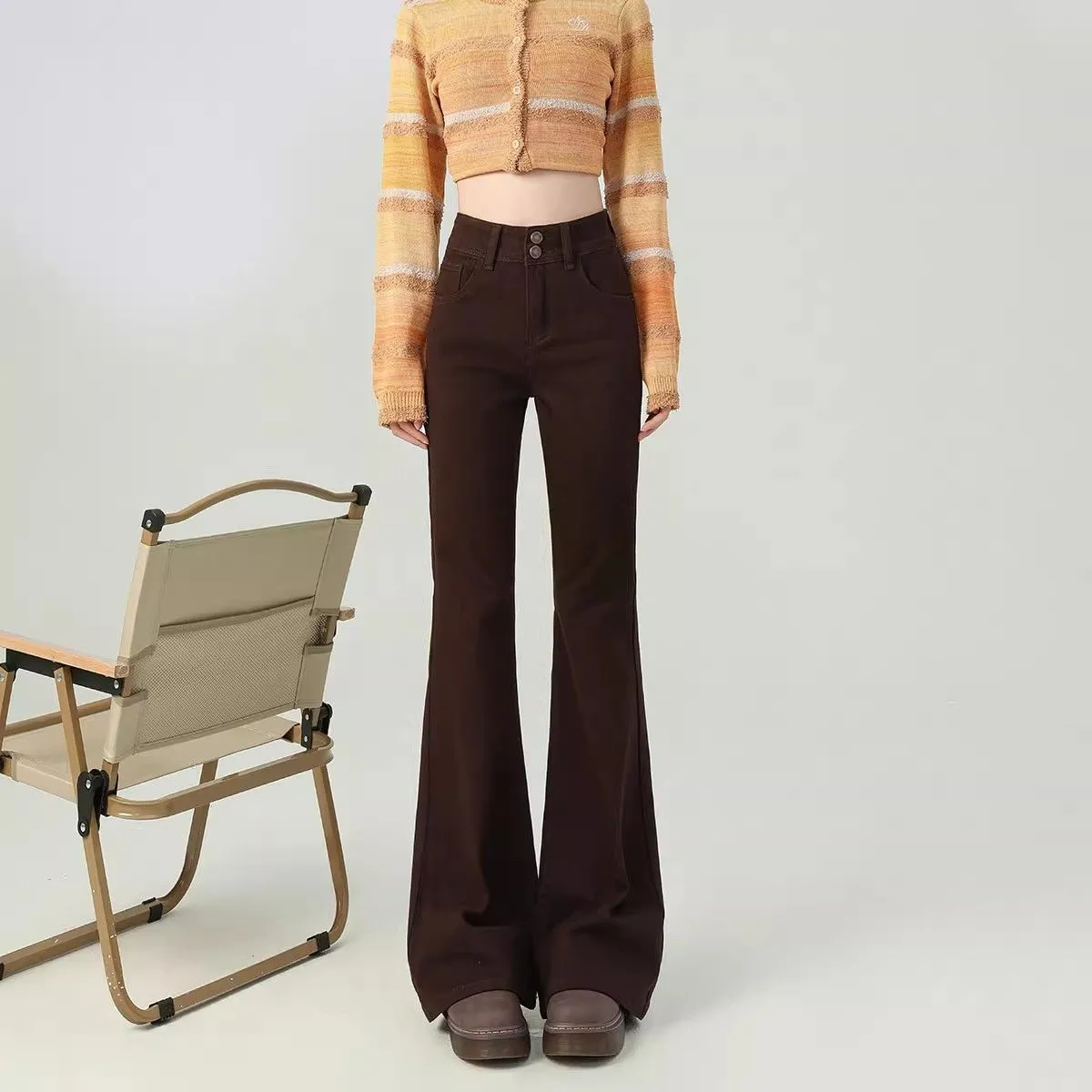 Brown high-waisted cotton flared pants with double-button closure for petite women, front view