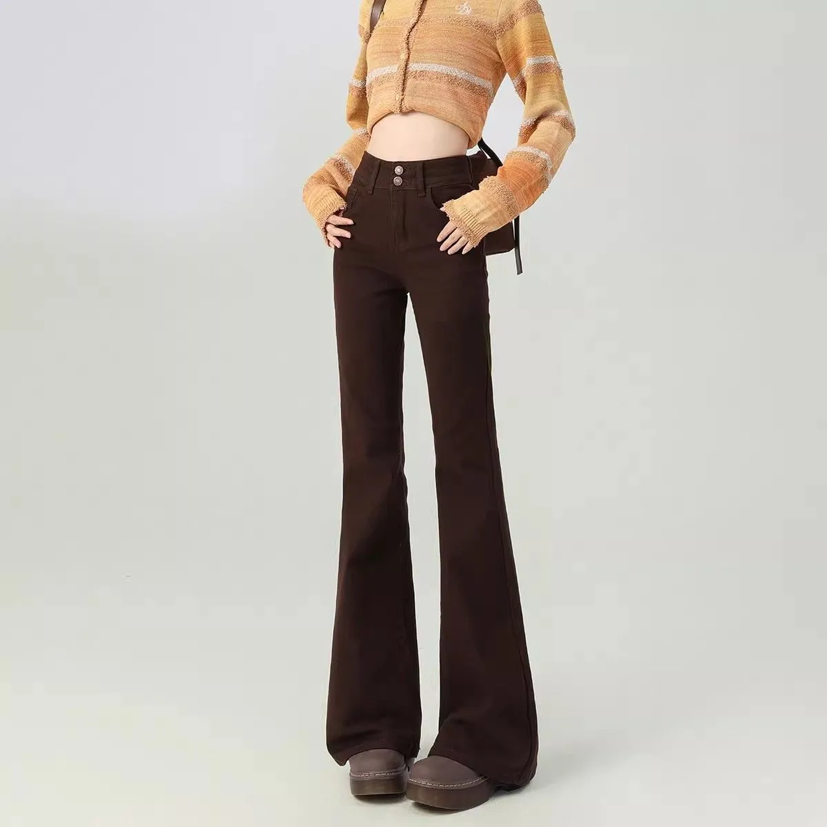 Brown high-waisted cotton flared pants with double-button closure for petite women, front view
