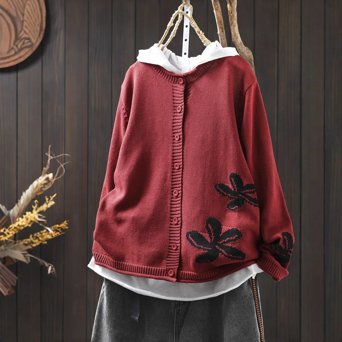 Women's loose retro flower contrasting knit cardigan with button front in khaki, showing long sleeves and floral pattern