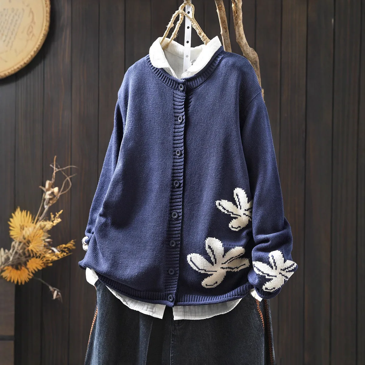 Women's loose retro flower contrasting knit cardigan with button front in khaki, showing long sleeves and floral pattern