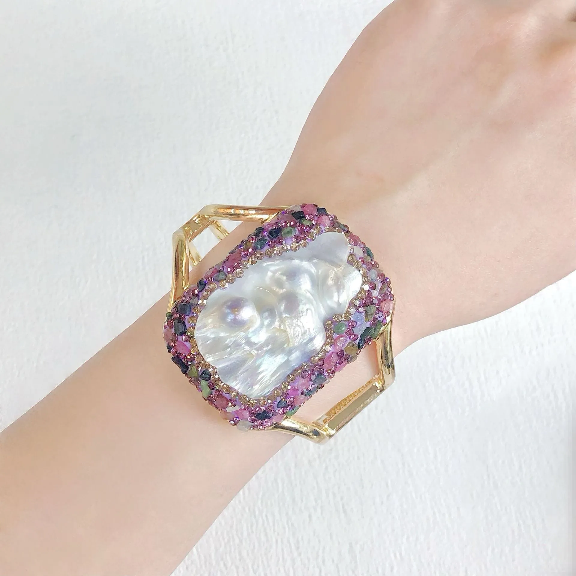 Handmade natural Baroque pearl purple bracelet with irregular exaggerated shapes on white background