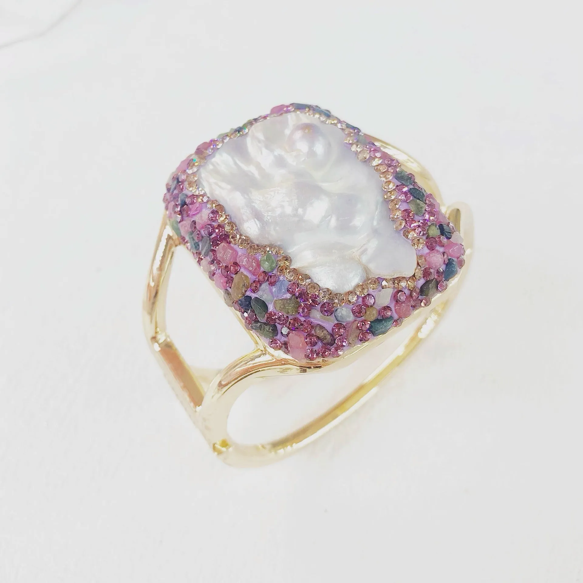 Handmade natural Baroque pearl purple bracelet with irregular exaggerated shapes on white background