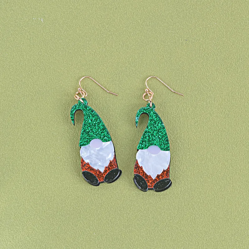 Cartoon Santa Claus character earrings in acrylic with red, green, or mixed hat styles