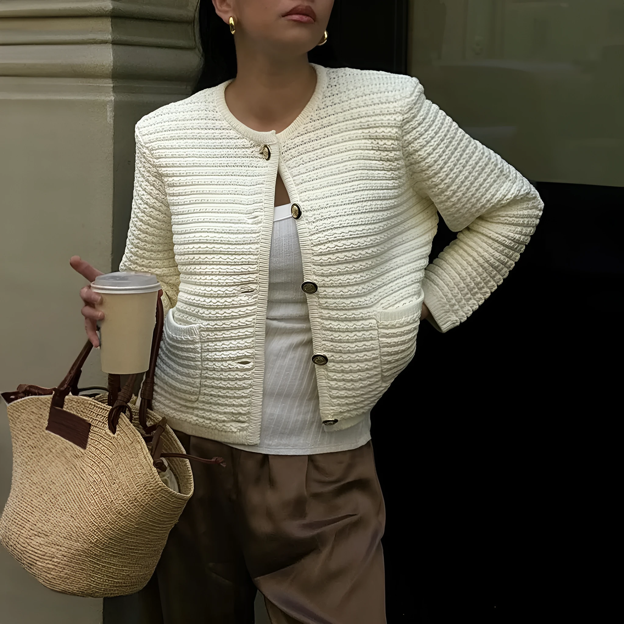 White women's long sleeve button shirt sweater made from polyester, front view